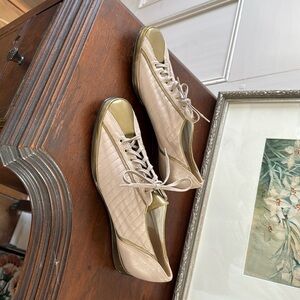 Amalfi by Rangoni 
Narrow gold and taupe flats